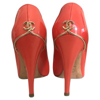 Chanel Pumps/Peeptoes Patent leather in Red