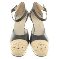 Max Mara pumps with hole pattern