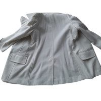 The Row Jacke/Mantel aus Wolle in Creme