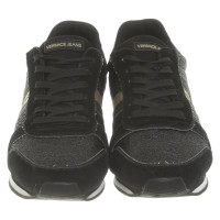 Versace Sneakers aus Wildleder in Schwarz