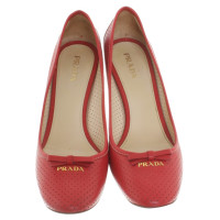 Prada pumps in red