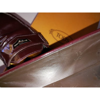 Tod's Slipper/Ballerinas aus Lackleder in Bordeaux