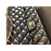 Chanel Classic Flap Bag Maxi Leer in Zwart