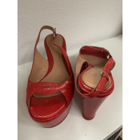 Sergio Rossi Chaussures compensées en Cuir verni en Rouge