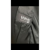 Versace Blazer aus Wolle in Schwarz
