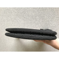 Gucci Clutch aus Canvas in Schwarz