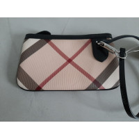 Burberry Clutch aus Canvas in Beige