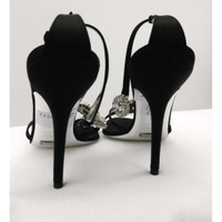 Dolce & Gabbana Pumps/Peeptoes aus Seide in Schwarz