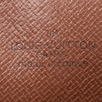 Louis Vuitton Clutch Bag Canvas in Brown