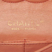 Chanel Classic Flap Bag Medium Leer in Oranje