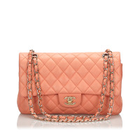 Chanel Classic Flap Bag Medium Leer in Oranje