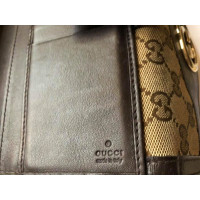 Gucci Täschchen/Portemonnaie in Braun