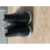Prada Sneakers aus Leder in Schwarz