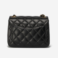 Chanel Classic Flap Bag New Mini Leer in Zwart