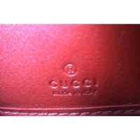 Gucci Tasje/Portemonnee Leer in Rood