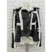 Alexander McQueen Jacke/Mantel aus Leder in Schwarz