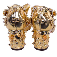Dolce & Gabbana Pumps/Peeptoes Lakleer in Goud