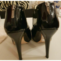 Jimmy Choo Stivaletti in Pelle verniciata in Nero