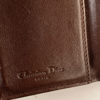 Christian Dior Täschchen/Portemonnaie aus Canvas in Ocker