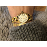 Yves Saint Laurent Armbanduhr aus Stahl in Gold