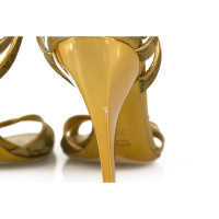 Gucci Sandalen aus Canvas in Gold