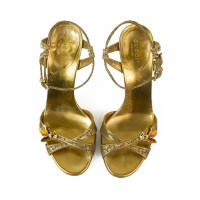Gucci Sandalen aus Canvas in Gold