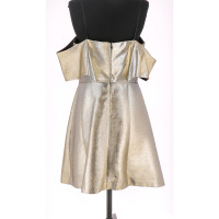 Sandro Kleid aus Baumwolle in Gold