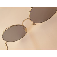 Nina Ricci Sonnenbrille in Gold