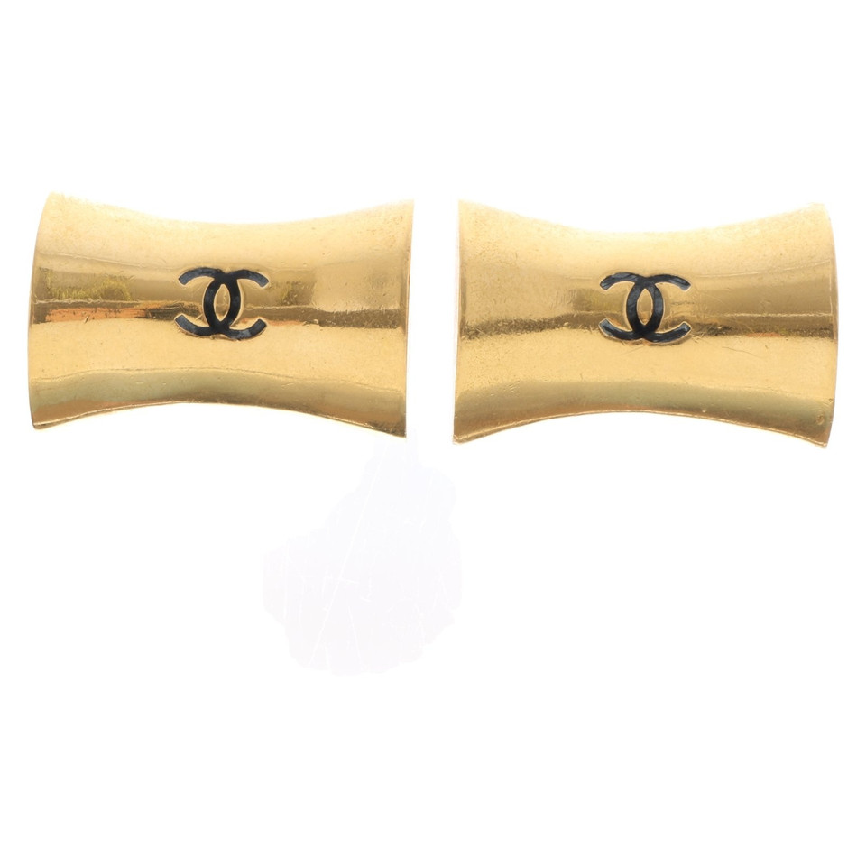 Chanel Gold colored ear clips with logo