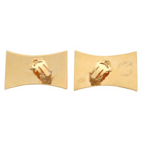 Chanel Gold colored ear clips with logo
