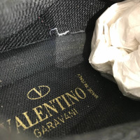 Valentino Garavani Sneakers aus Leder in Bordeaux