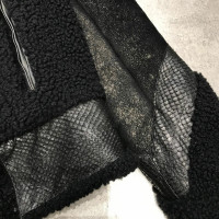 Givenchy Jas/Mantel Bont in Zwart