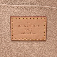 Louis Vuitton Clutch aus Canvas in Braun