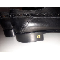 Louis Vuitton Schnürschuhe aus Leder in Schwarz