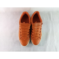Balenciaga Sneakers aus Leder in Orange