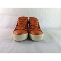 Balenciaga Chaussures de sport en Cuir en Orange