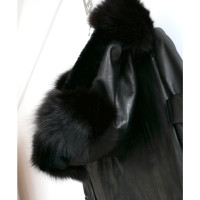 Yves Saint Laurent Jacke/Mantel aus Leder in Schwarz