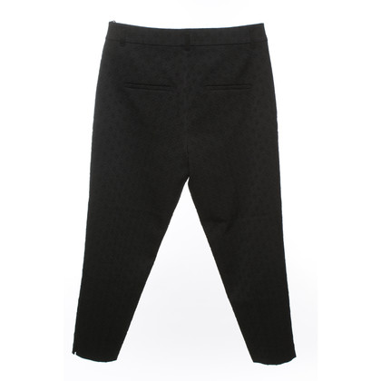 Schumacher Pleated trousers in black