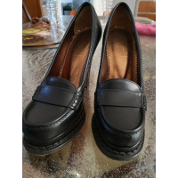 Yves Saint Laurent Chaussons/Ballerines en Cuir en Noir