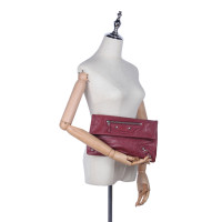 Balenciaga Clutch aus Leder in Violett