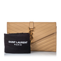 Saint Laurent Clutch aus Leder in Beige