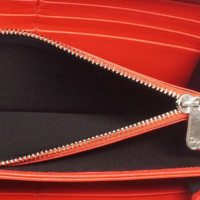 Christian Dior Täschchen/Portemonnaie aus Leder in Rot