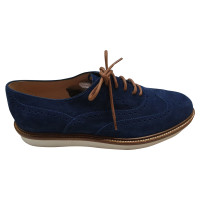 Tod's Chaussures à lacets en Daim en Bleu