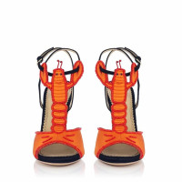 Charlotte Olympia Sandalen aus Leder in Orange
