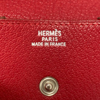 Hermès Sac à main/Portefeuille en Cuir en Rouge