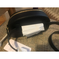 Prada Sac à bandoulière en Cuir en Noir