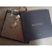 Gucci Accessoire aus Leder in Gold