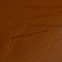 Yves Saint Laurent Muse Patent leather in Brown