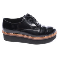 Tod's Pumps/Peeptoes aus Leder in Schwarz