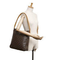 Louis Vuitton Sac fourre-tout en Toile en Marron